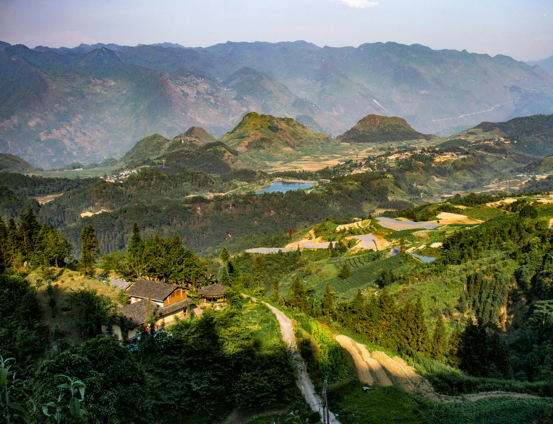 Layered mountains and a valley village in Ha Giang, Vietnam