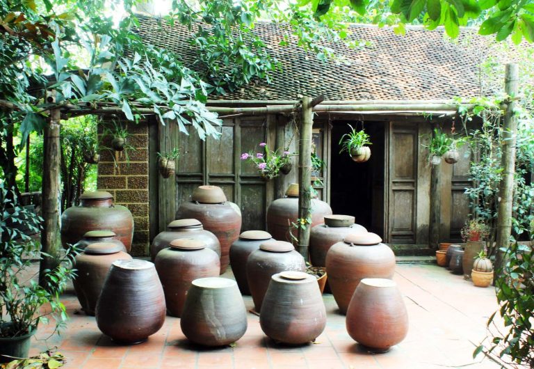 Ancient house and clay jars in Duong Lam Village