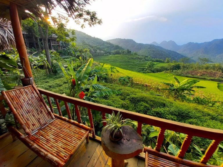 Balcony view over the rice terraces at a Pu Luong eco-lodge - Rose Travel