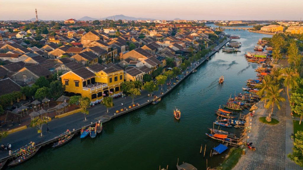 Aerial view of Hoi An Old Town and the Hoai River at sunset